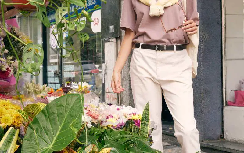 woman shopping for low light plants in edmonton